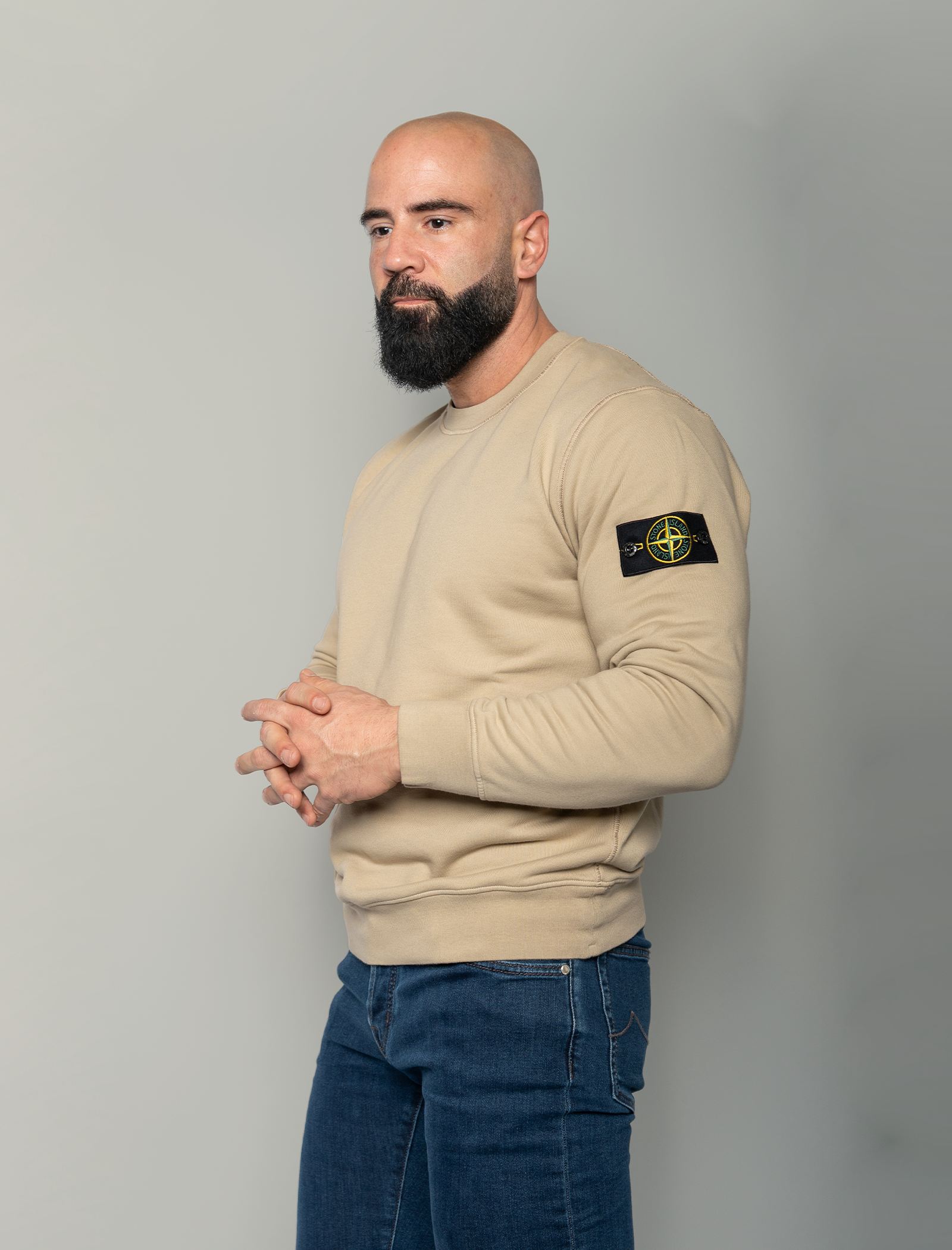 Compass badge sweater